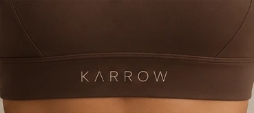 Tonal KARROW wordmark on the under-bust band